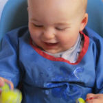 Boy in highchair